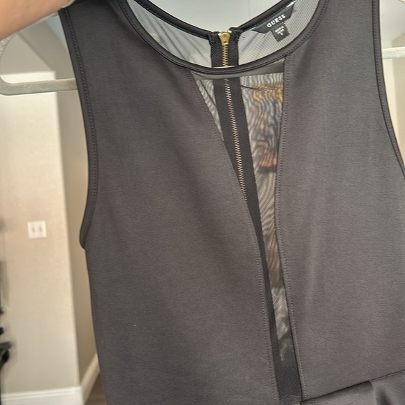 GUESS fitted peplum cocktail dress. Full mesh back & sexy mesh detail on front. - Picture 5 of 9